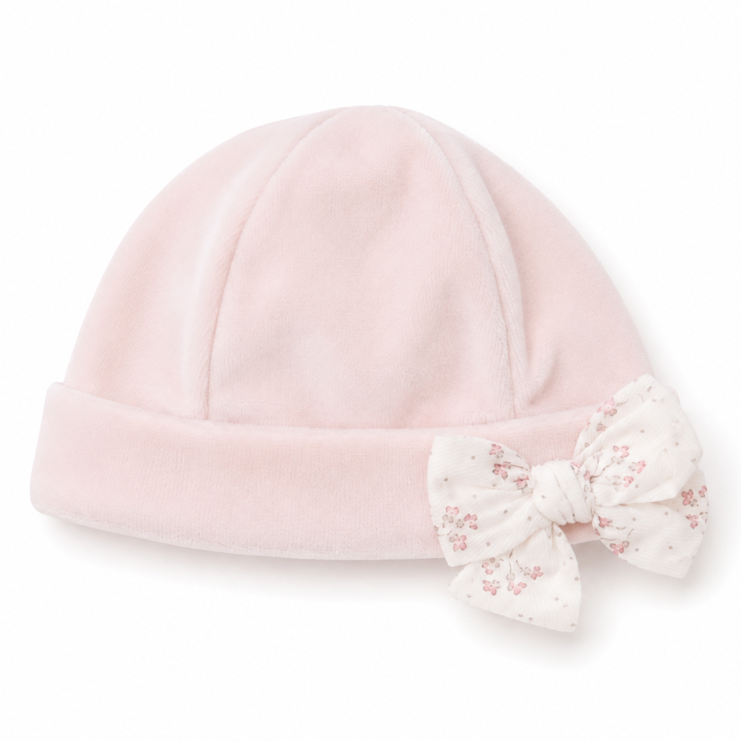 velours baby mutsje in peach pink met strik van baby gi
