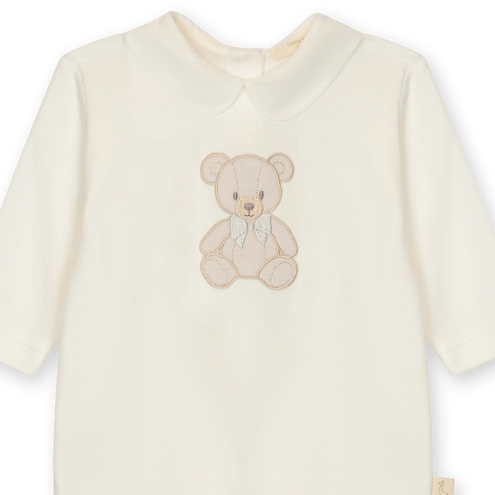 Katoenen babypakje met ronde kraag en teddybeer detail in crème kleur