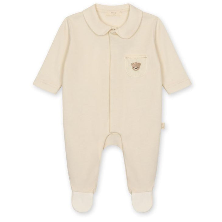 beige babypakje met geborduurd beertje, unisex van het merk Baby Gi 