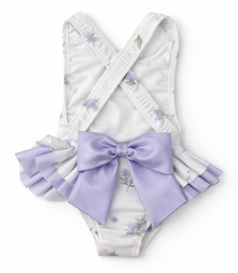 achterkant van meia pata badpak met strikken en lavendelprint 