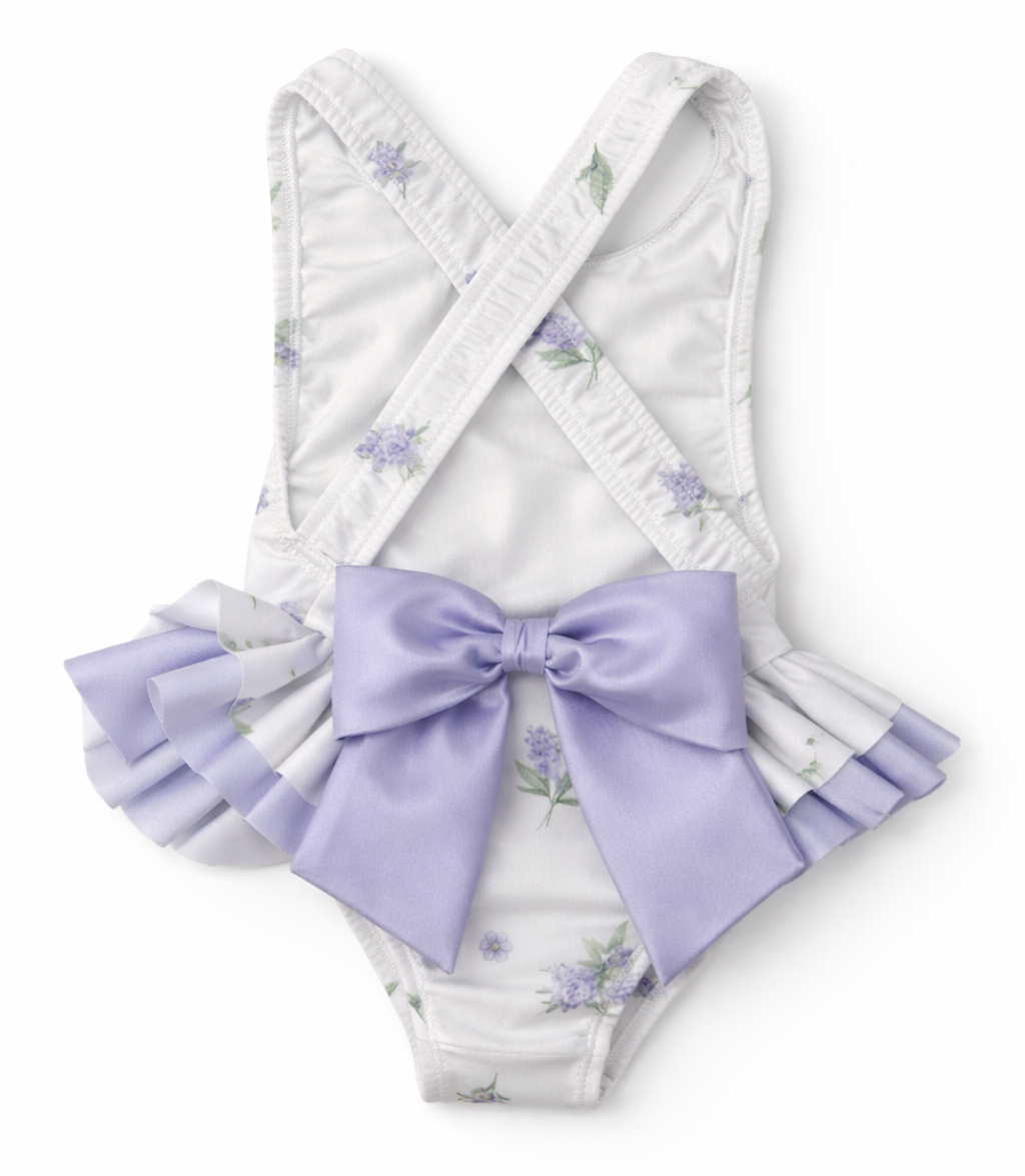 achterkant van meia pata badpak met strikken en lavendelprint 