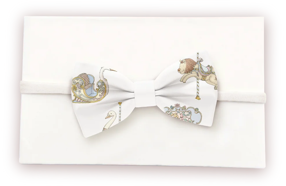 Atelier Choux haarband met strik Carousel dessin voor baby en meisje