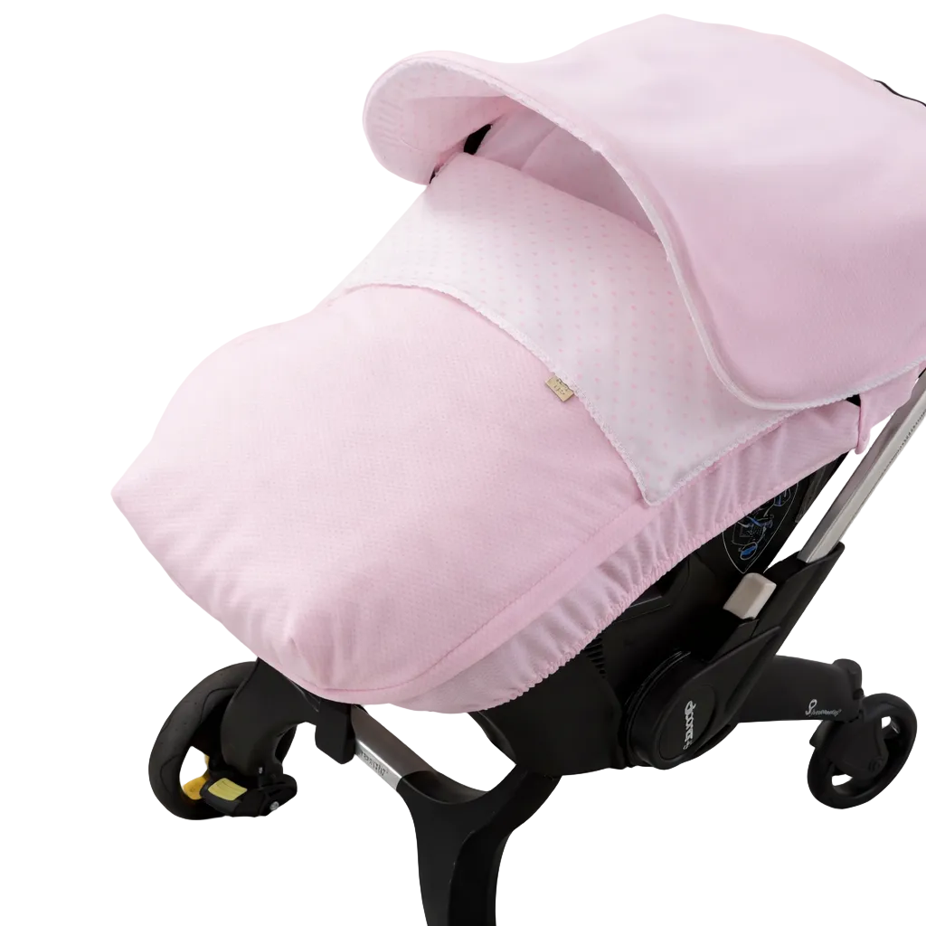 donna cover in pique en plumenti stof in lichtroze