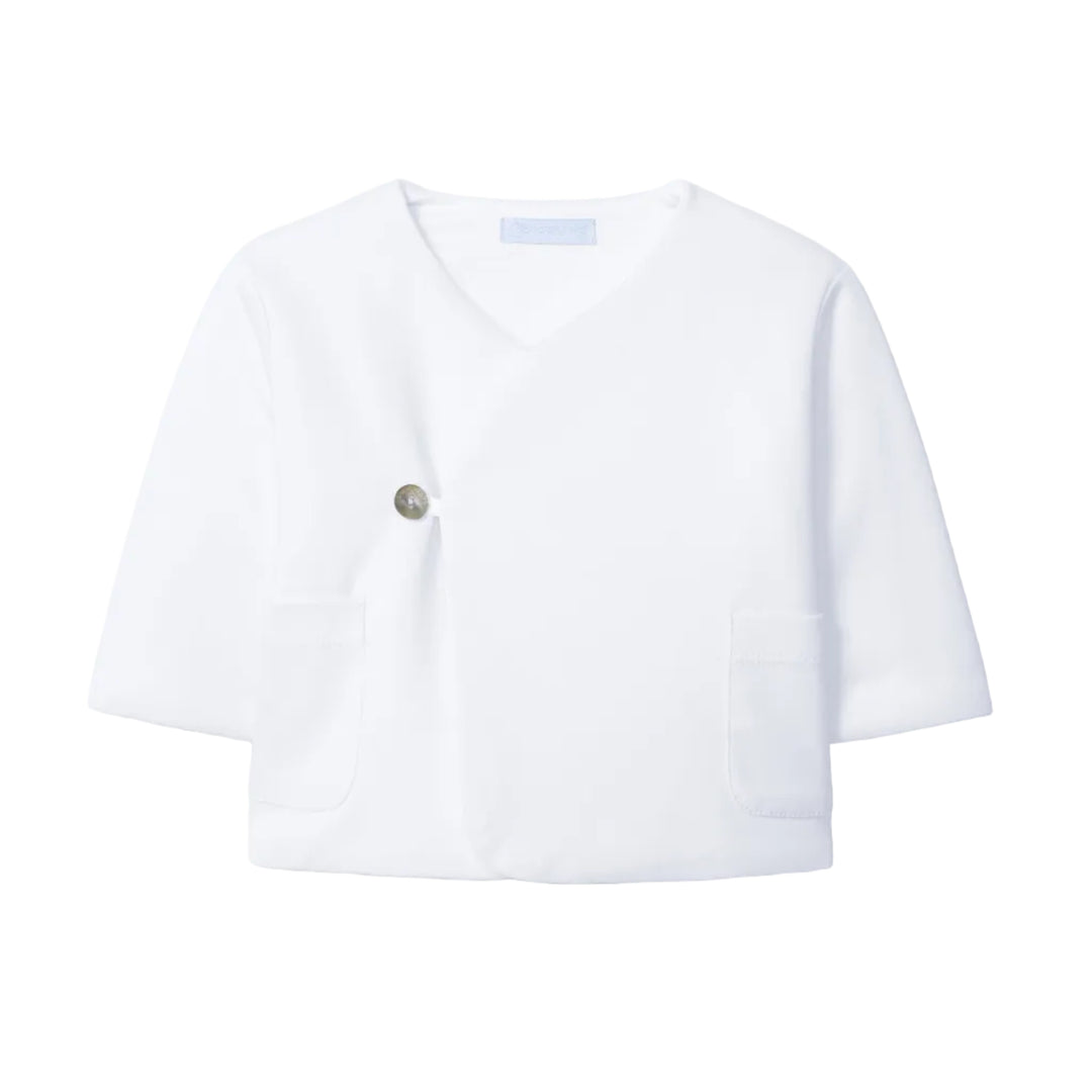 Basic unisex babyjasje in wit van Laranjinha