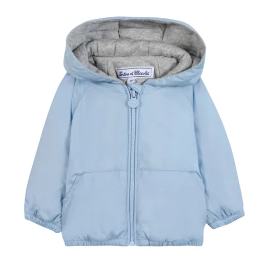 Lichtblauw baby jasje van Tartine et Chocolat met capuchon en ritssluting