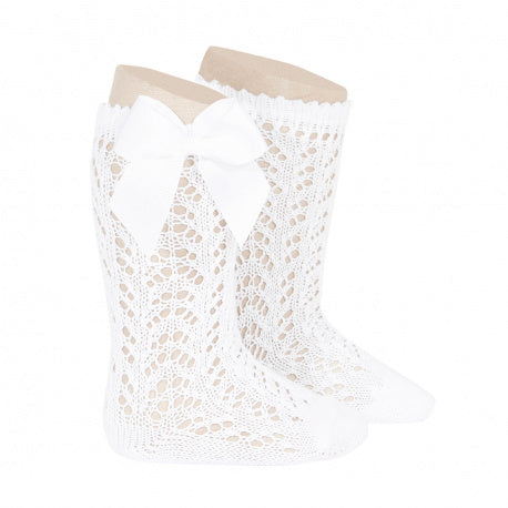 Kniekousen opengewerkt met grosgrain strik wit