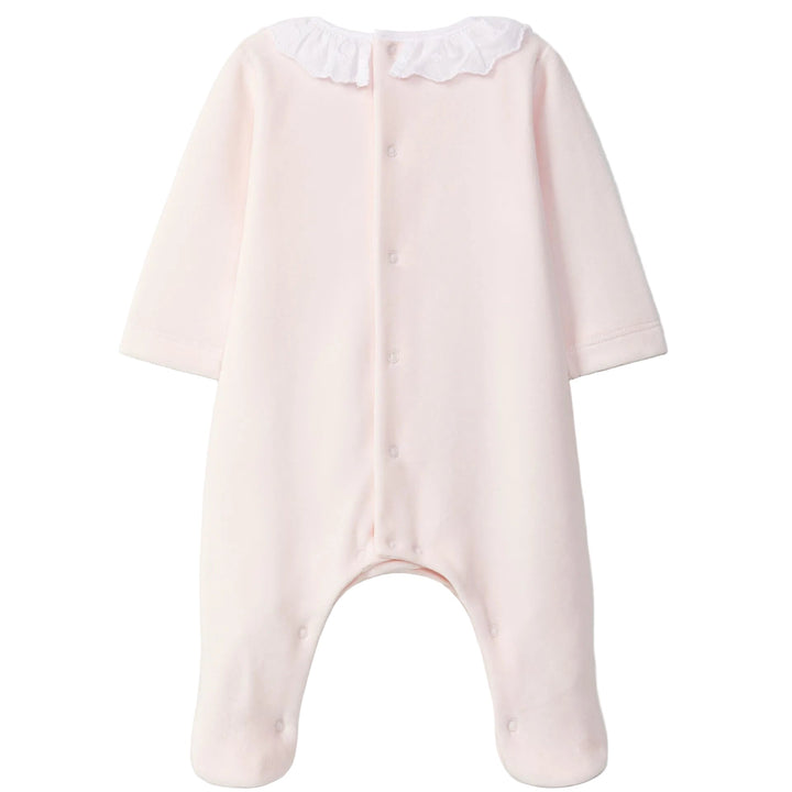 achterkant van babypakje in peach pink velours 