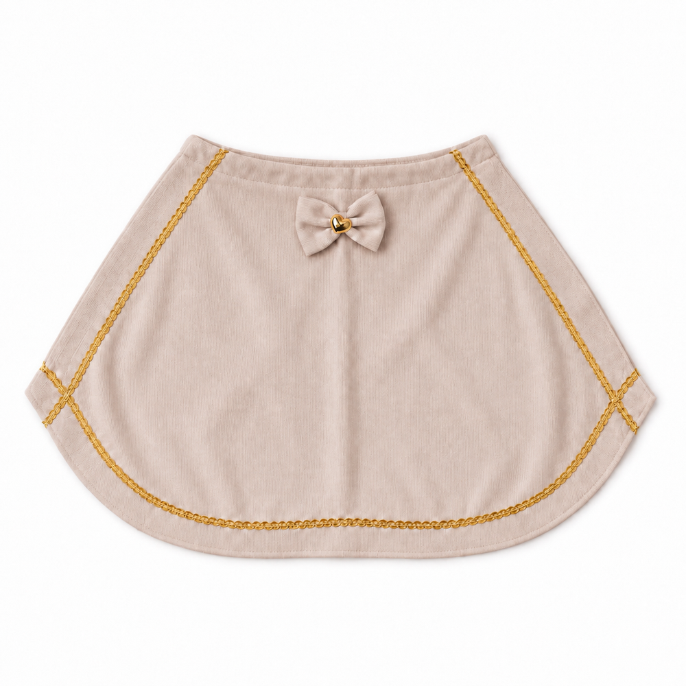 beige bietencape met strik van little mack