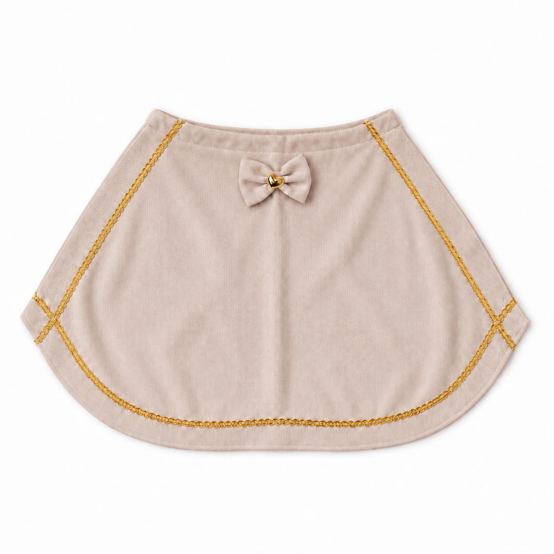 beige bietencape met strik van little mack