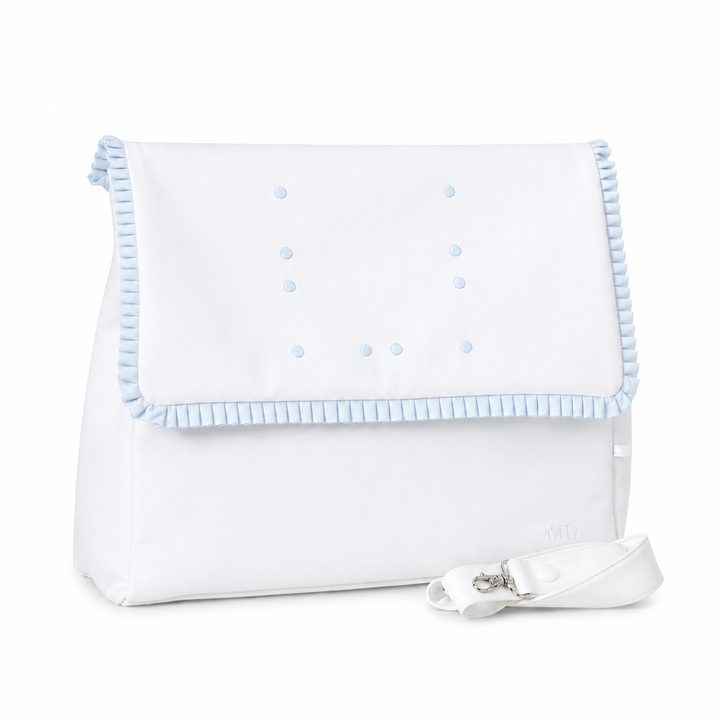 witte luiertas met lihctblauwe pique details