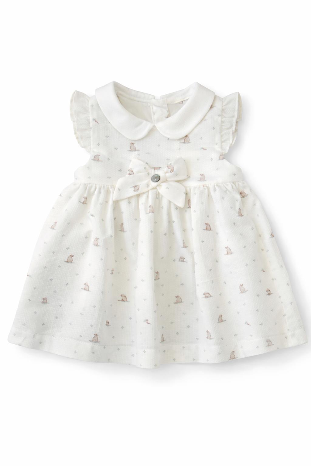 Wit baby jurkje Pureté du Bébé met konijntjesprint, ruches en strik – Little Mack