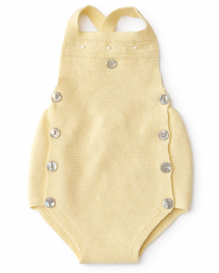 gebreide romper in butter yellow van het merk Martin Aranda