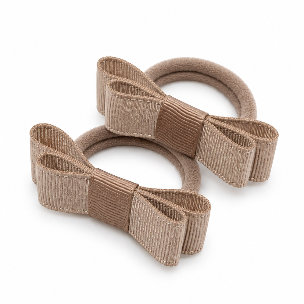 taupe kleurige haarstrikjes met grosgrain strik van siena 