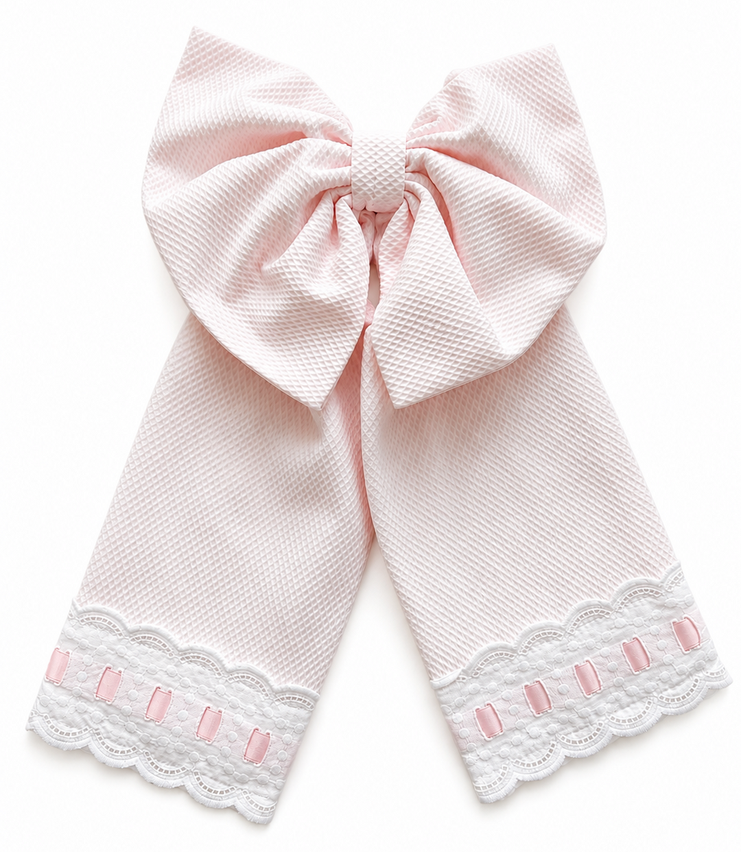 Babyroze strik met broderie rand van pique katoenen stof