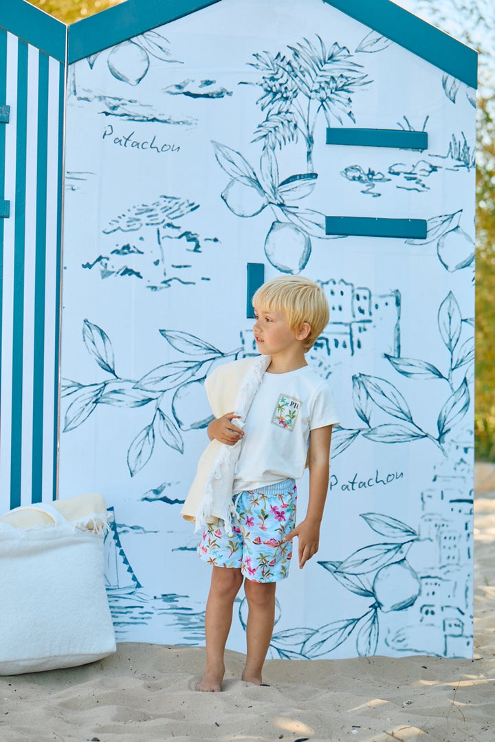 Zomers zwemsetje met palmbomen en zee van Patachou