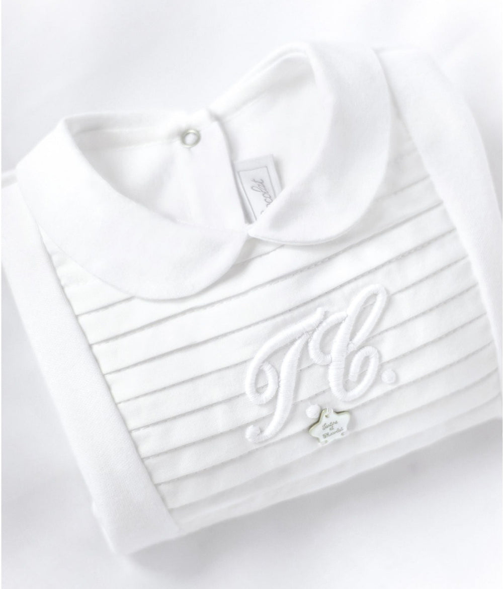 close up van Tartine et chocolat babypakje met TC logo en plisse details in offwhite 