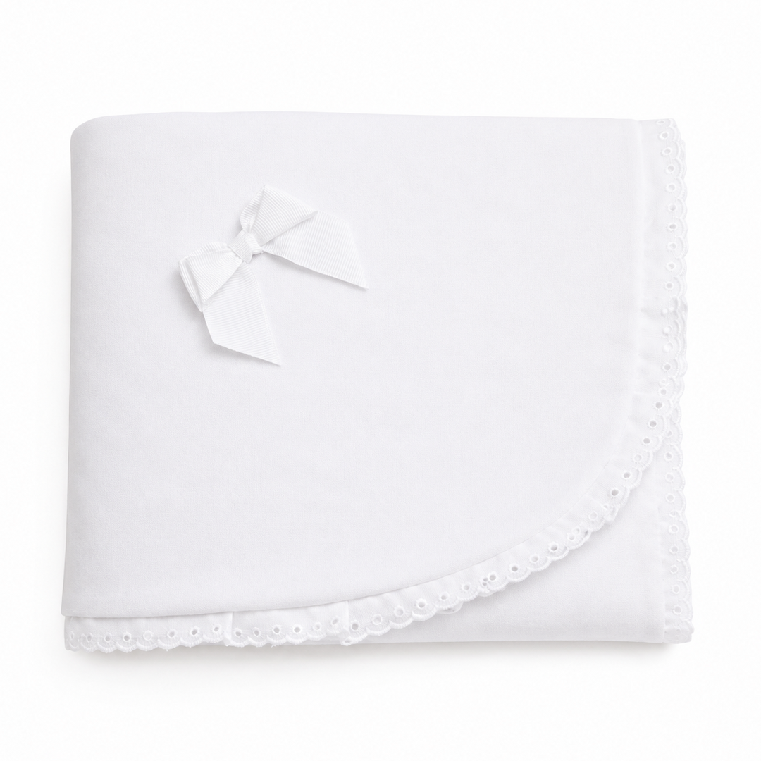 witte velours deken met broderie rand en grosgrain strik