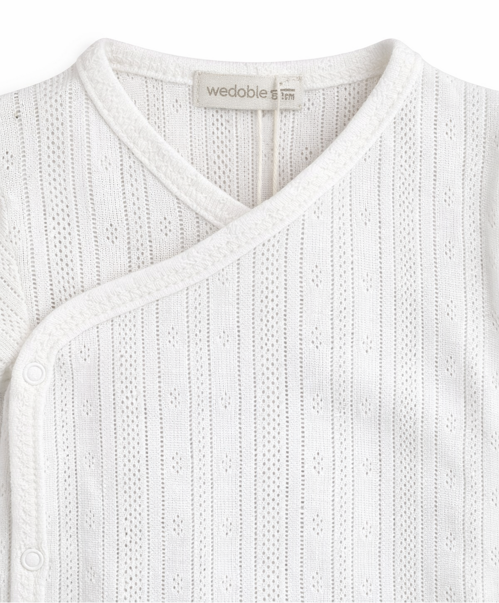 Baby romper wit structuur stof Wedoble